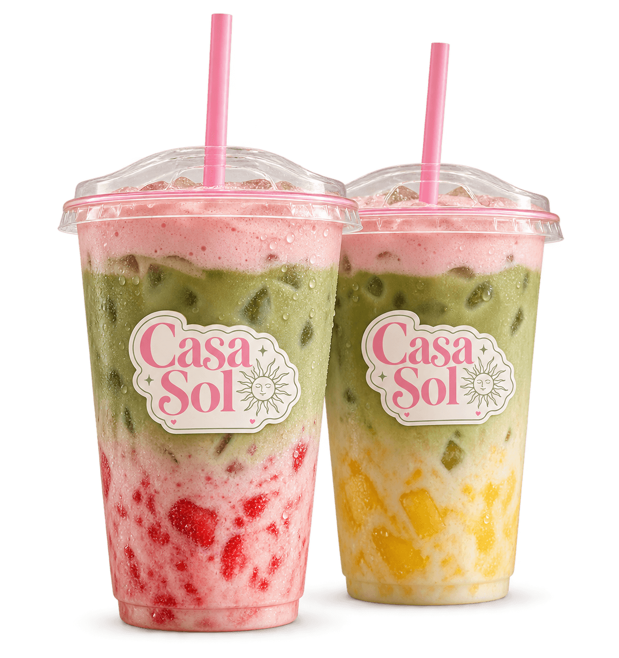 Strawberry and pineapple matcha with pink cold foam in Casa Sol cups